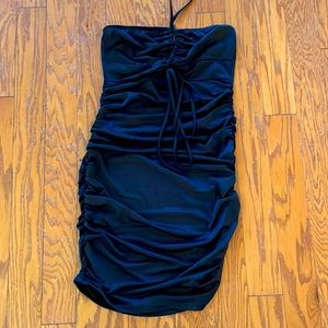 Mini black halter dress with full length scrunch on both sides